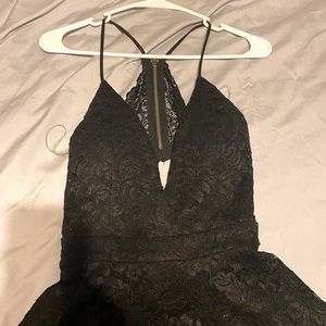 Semi formal little black dress. Lace over lay. Size M
